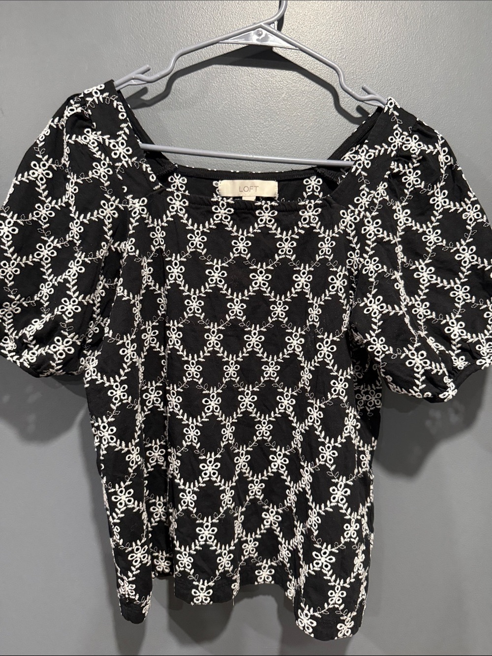 LOFT Black Top with White Floral Lattice Embroidery and Puff Sleeves